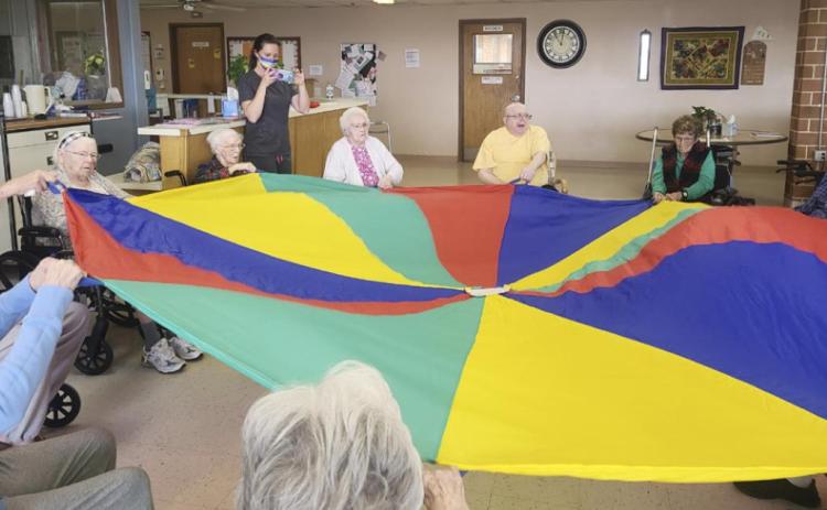 Doing a parachute exercise.