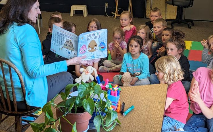 She may be “retired” from the ESU, but Crazy Lou (Lou Cox-Fornander) still stops in at Mullen Elementary from time to time. No one reads quite like Lou does and the kindergarten and first graders hung onto every word of “The Great Eggscape!” last Thursday. Donalee Barner