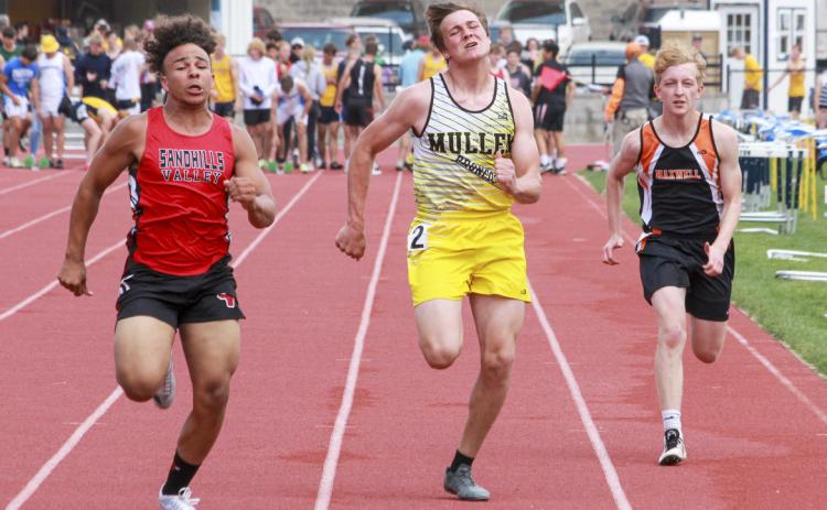 Tate Kvanvig in the 100 prelims at Districts last week in Paxton. Carolee Brown