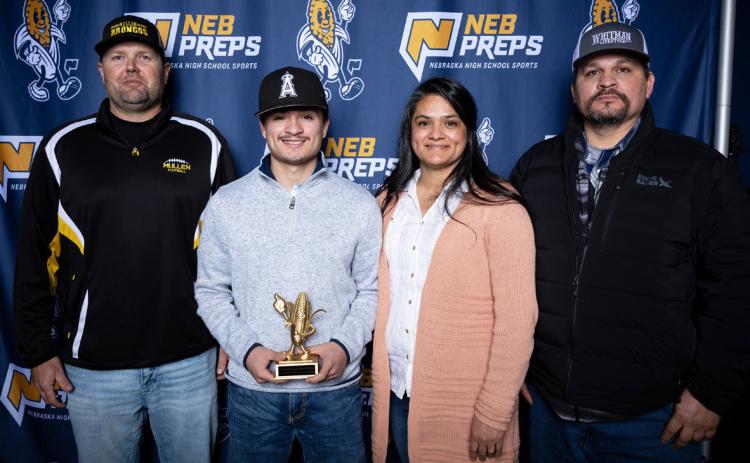 L-r: Mullen Bronco Head Football Coach Wade Marsh and Nicholas Gonzalez with his parents, Lorena and Manuel Gonzalez. courtesy photo