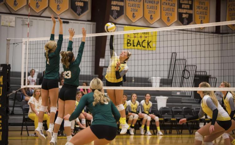Taylor Svoboda with a hit last Saturday at the Mullen Triangular. Megan Andersen
