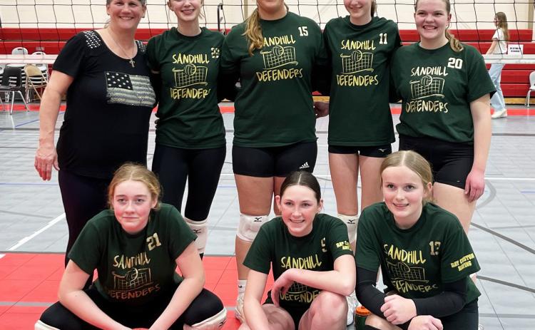 The Sandhill Defenders volleyball team competed at the 4 Corners Club Tournament in Broken Bow on Sunday, March 9. Pictured back, l-r: Coach Barb McIntosh, Josie Morrow, Kaley Rasmussen, Abby Gracey, Maci Walz. Front: Kassidy Cheever, Breckyn Burney, Whytlea Cooley. The tournament was split into 3 pools, with the team missing the championship pool by 3 points, seeding them 1st in the consolation pool. The girls won that pool by beating Kearney VB and Level Up. courtesy photo