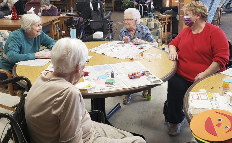 Working on the tree craft. L-r: Marty Boyer, Marlene Dykes, Nadene Andersen and Vicky Earl.