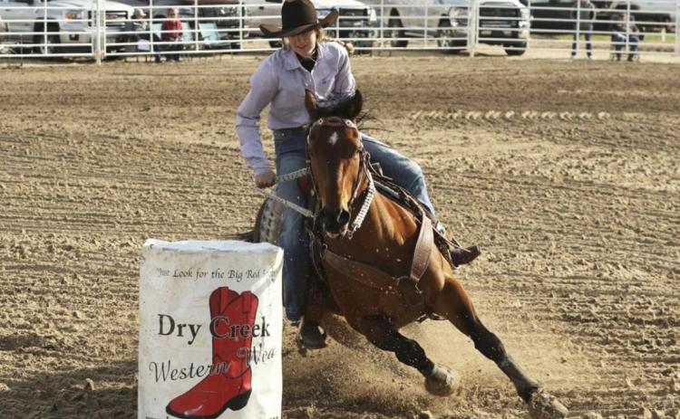 Whitney Jennings competes in the barrels at Burwell on May 8. Jill Saults