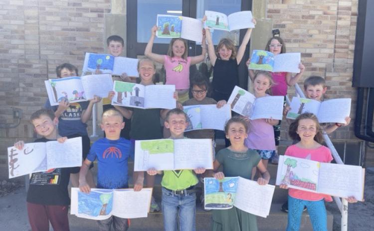 Plan, draft, edit and publish. The 2nd grade students worked hard to publish and illustrate a book called 'The Curious Tree.' The book is about a curious tree that gets planted in a park and tells about all the things he sees, feels, smells and hears. Emily Brown