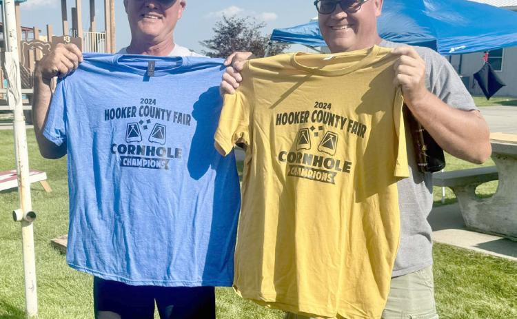 Phil Hoyt (left) and Mike Kvanvig were the winners of the Cornhole Tournament held last Friday afternoon, Aug. 2. Carolee Brown