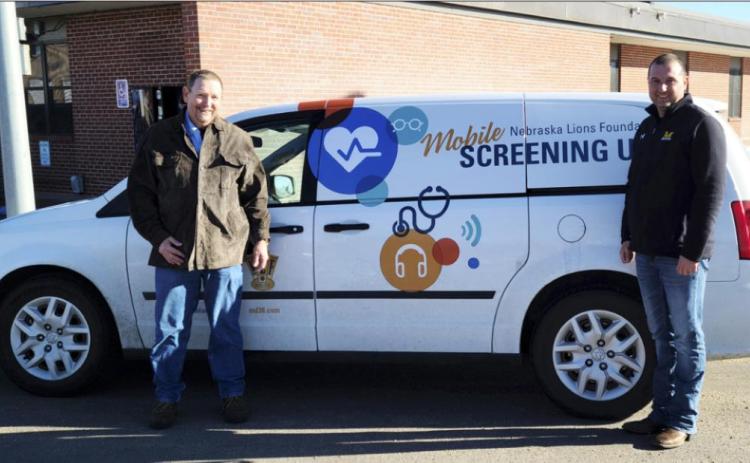 Steve Steward (left), Mobile Screening Unit driver, and Ryan Ridenour, Mullen Lions Club member, assisted with the screenings along with other local members including Dawn Mallory and Shelby Ridenour, as well as Bri Moore, school nurse. Shelby Ridenour