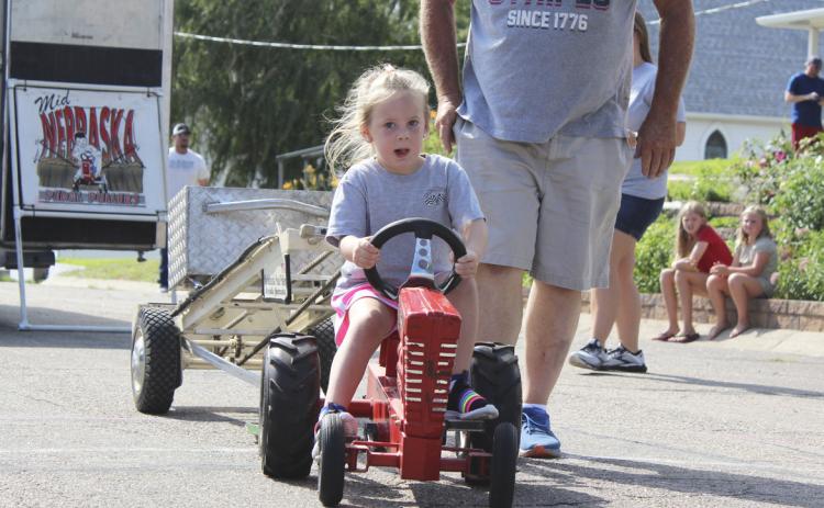Kinley Crisp won the 4-year-old girl division of the Pedal Tractor Pull last Saturday. Gerri Peterson