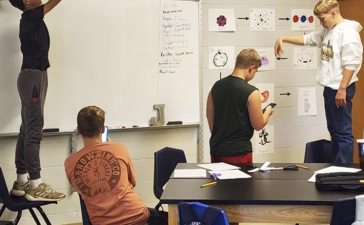 In Mrs. Jewell’s junior high science classes, the 8th graders have been experimenting with creating circuits while learning how electricity flows. The 7th graders (pictured) had a review of the scientific method when they did a lab to test paper helicopters. Tawn Jewell