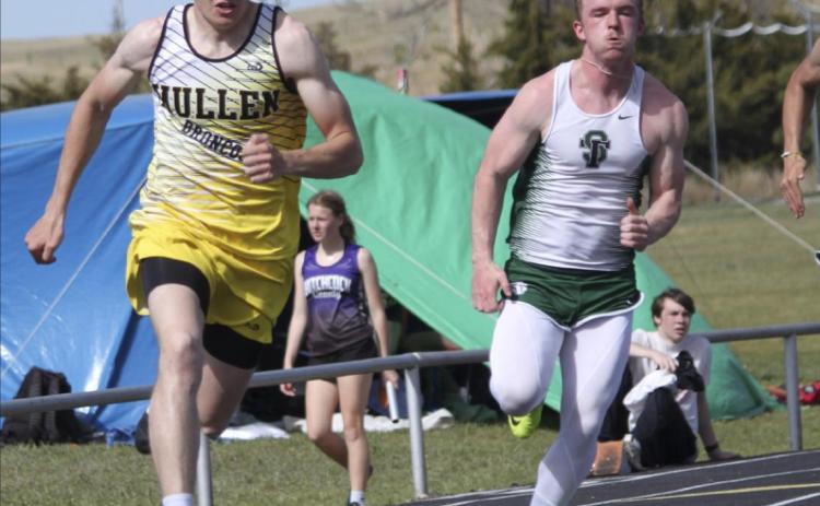 Jaden Emerson rounds the corner in the 200 finals at Arnold. Jill Coble