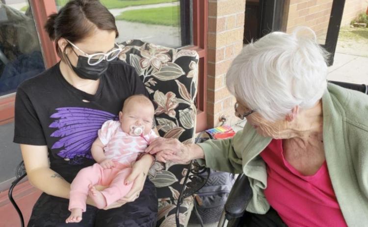 Katie Dailey and baby Ophelia came and visited! She’s so cute and as you can tell, the residents enjoyed seeing them! Pictured is Marlene Dykes.