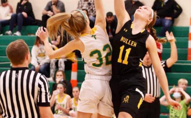 Samantha Moore reaches for the ball during tipoff of the Lady Broncos’ game at North Platte St. Pat’s last Tuesday. Sue Licking