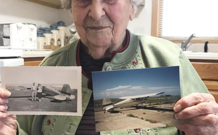 Goldie Little holds then and now photos of the airplane that she learned to fly in.