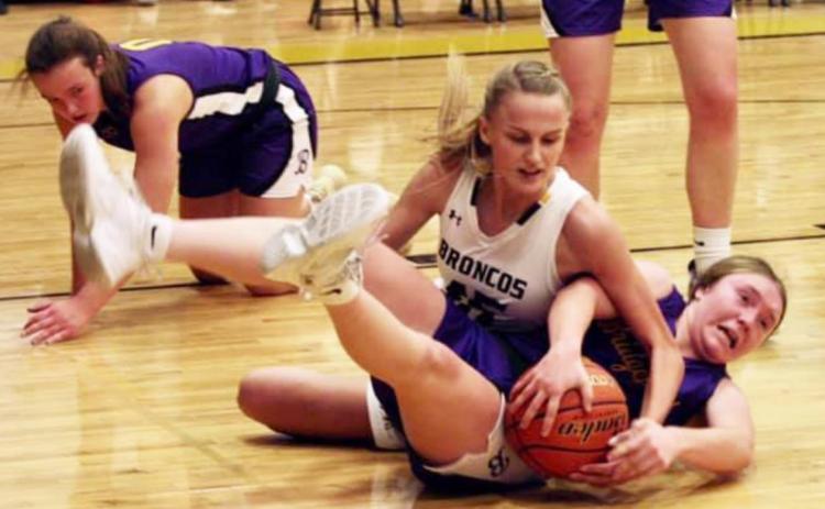 Brooke McCully fights for a lose ball against Bridgeport. Sue Licking