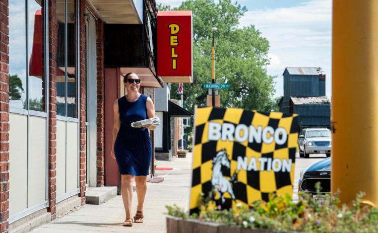 Gerri Peterson, owner and editor of the Hooker County Tribune, walks back to her office after walking down to the post office to get the mail on Monday, Aug. 11, 2025. Isaac Hale - Deseret News