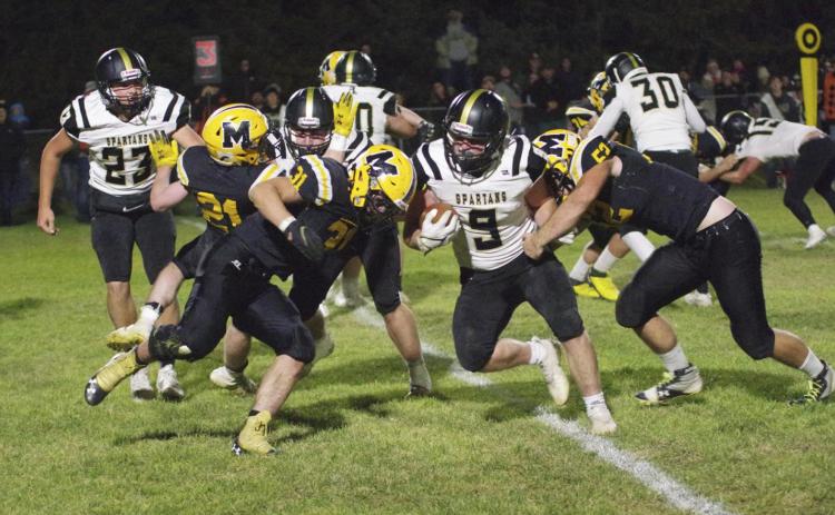 #31 Spencer DeNaeyer and #52 Adam Wiens on defense last week against Ansely-Litchfield. Pam Ginkens