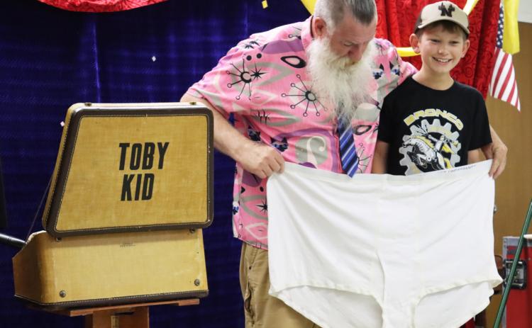 Cooper Phillips helped Toby turn a cloth into some BIG underwear.