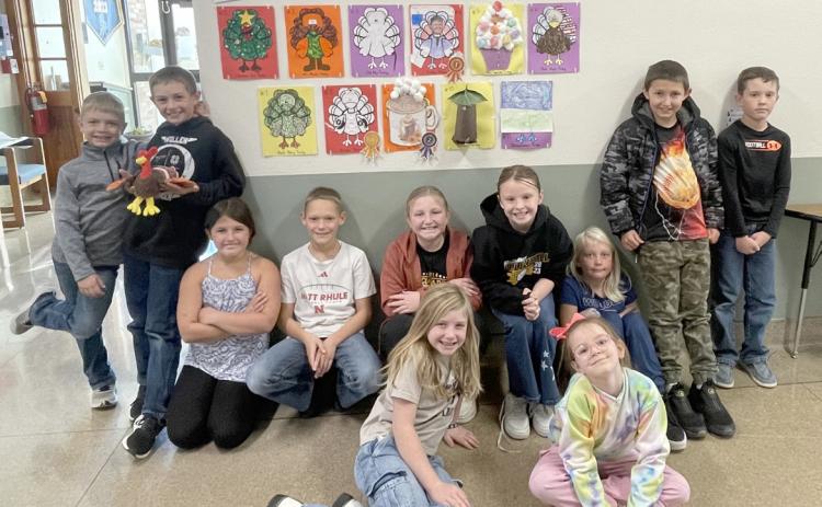 The 3rd grade tried to save some turkeys this Thanksgiving season by creating some awesome disguises. “Turkey Trump” by Grady Phipps took the top place in the voter pool of Mullen Elementary School. Tatum Deibler got 2nd with “Cocoa the Turkey” and Eli Barnes got 3rd with “Pirate Turkey.” Pictured back, l-r: Killian Kearns, Grady Phipps, Zandra Hebbert, Eli Barnes, Tatum Deibler, Sadie Hoyt, Daryl Deibler, Marcus Lattin, Holt Morrison. Front: Marki Finney, Anna Hessin. Krista Schoonveld