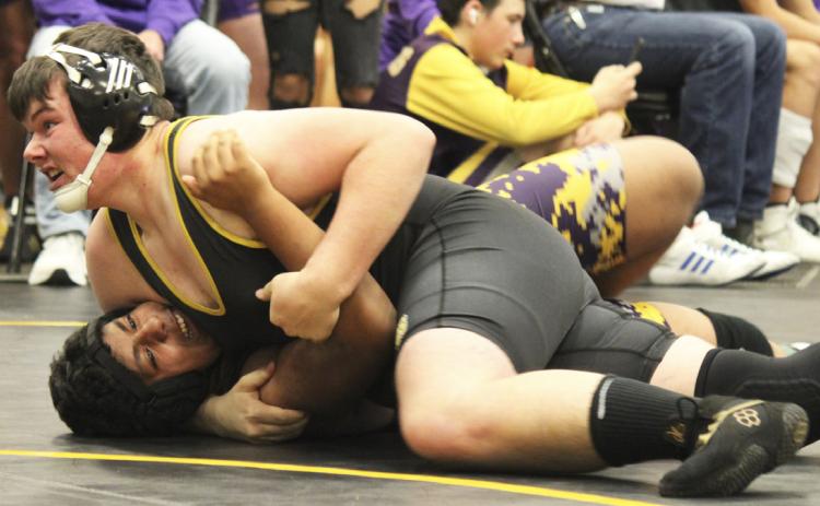 Senior Owen Thorberg competes at the Mullen Wrestling Invite. Kris Forsen