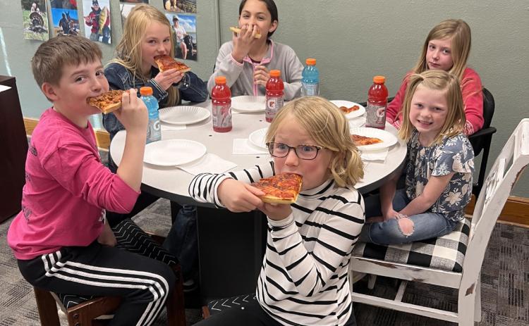 Pictured clockwise around the table from the left: Zach Hicks, Ayden Lee, Luciana Gonzalez, Marki Finney, Meyer Vinton, Fallon Lee. Brett Mauler
