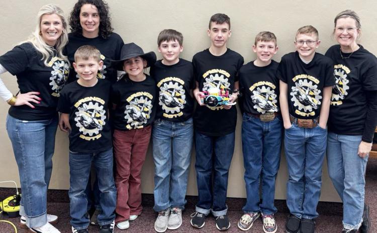 L-r: Coach Tami Miller, Coach Becky Mundorf, Cooper Phillips, Finley Mundorf, Zach Hicks, Brandt Mundorf, Duke Miller, Oakes Miller, Coach Heather Phillips. courtesy photo
