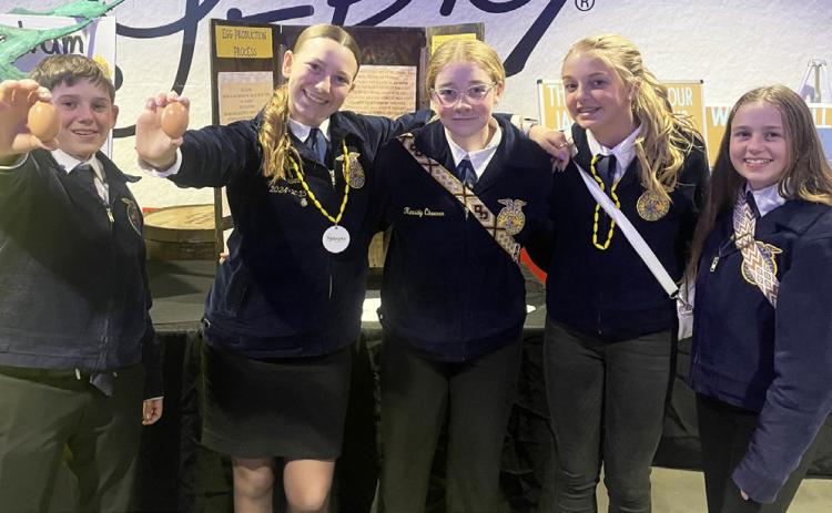 State FFA attendees pictured at their Hall of Chapter display about Nebraska egg production, l-r: Colin Connealy, Hope Miller, Kassidy Cheever, Kaisley Phipps, Audrabell Werth. Kelsey Phillips