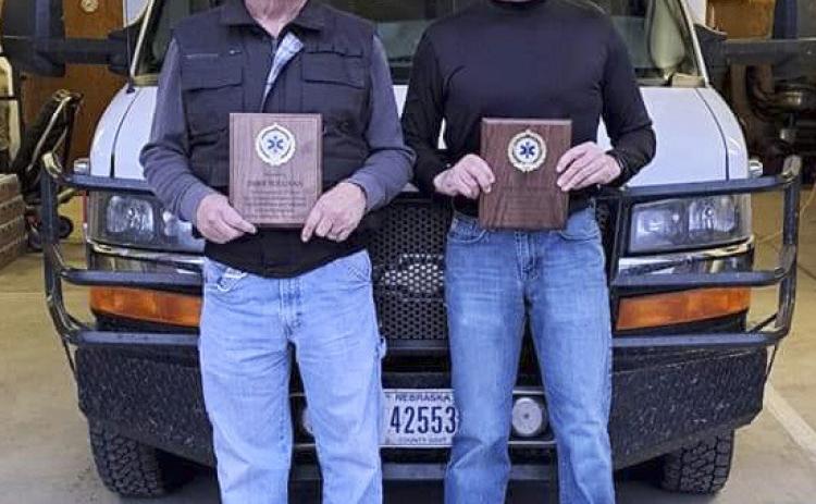 The Mullen Ambulance service recently thanked and said goodbye to two people on their squad. Dave Sullivan (left) retired after 33 years of service as an ambulance driver. Wynn Wiens was an EMT for 15 years and also served as the Hooker County Sheriff, was a volunteer fireman, and handled emergency management duties. He moved for a new job opportunity. courtesy photo