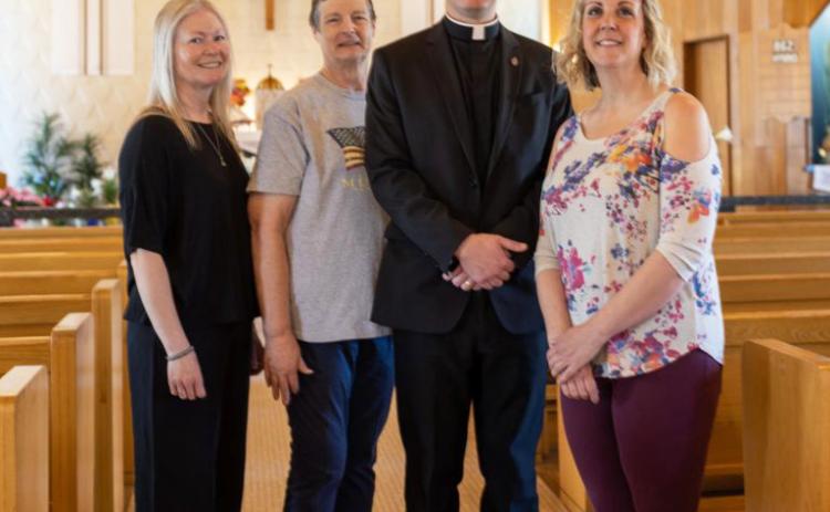 Parishioners at St. Mary’s, l-r: Leanne French, Carol Wright, Father Matthew Nash and Kris Forsen. Catholic Extension Society