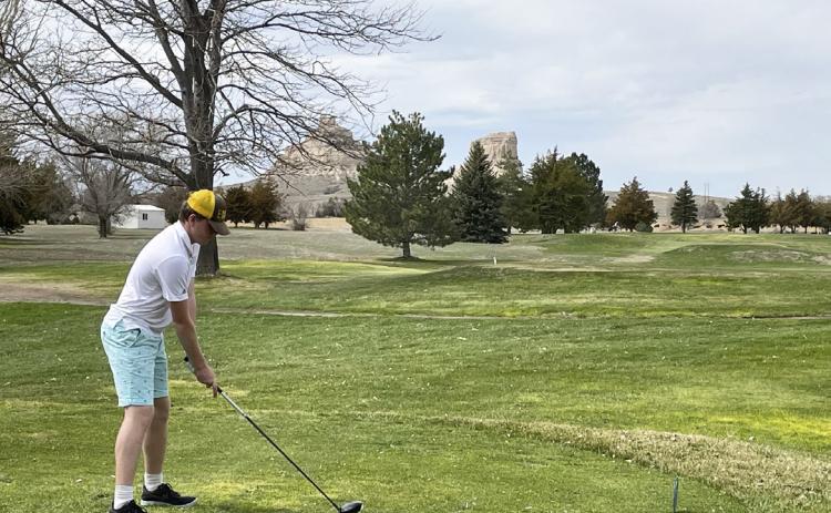 Right: Ethan Hardin gets ready to tee off at Bridgeport last week.
