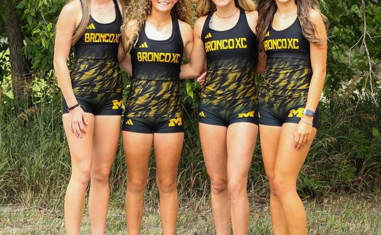 Cross country, l-r: Harper Andersen, Riley Hegland, Peyton Paxton, Adalena Hampton. Megan Andersen Photography