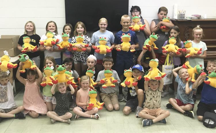 The Summer Reading Program, “All Together Now” was held at the Hooker County Library on June 8. Pictured with the frogs they made got to take home with them, back l-r: Tatum Deibler, Ella Walz, Lillian Ericksen, Elle Gracey, Ava Walz, Teal Peterson, Pandora Gray, Hunter Gray, Keira Kearns, Danielle Peterson. Front: Merick Lattin, Aislynn Connealy, Eve Ericksen, Aurora Polt, Natalee Walker, Meyer Vinton, Avery Vinton, Marcus Lattin, Cooper Phillips, Kayden Evans, Tate Phillips, Killian Kearns, Jaxyn Evans.