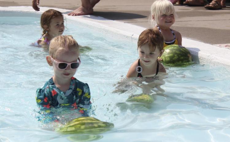 L-r: Aurora Polt, Addison Mundorf, Ryhme Pettit and Violet Stichka in the 0-3 Baby Pool Watermelon Race. Gerri Peterson