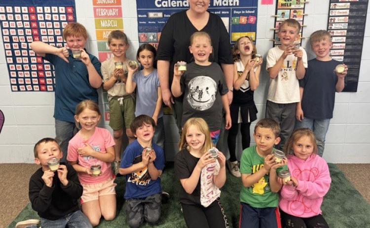 The first graders are pictured with their butter, back l-r: Lane Brown, Brogan Seeley, Addison Mundorf, Mrs. Myers, Harper Myers, Ryhme Pettit, Cooper Peers, Finnegan Connealy. Front: Wyatt Greeley, Brystol Call, Wesley Simmons, Ryann Walz, Austin Smith, Doris Boland. courtesy photo