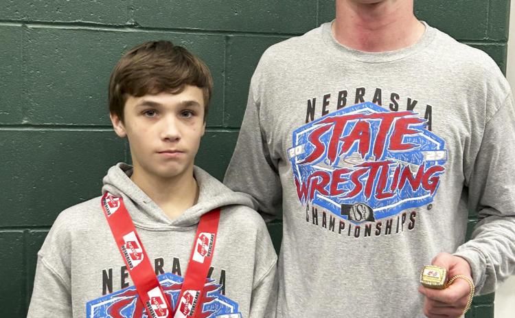 Gracey, Pettit win wrestling medals
