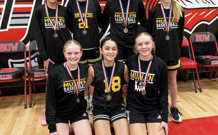 This group of Mullen girls won the 7th grade division of the Broken Bow basketball tournament on Saturday, Jan. 17 by winning against Holdrege and in overtime against Broken Bow. Pictured back, l-r: Emri Dent, Kendall Phipps, Parker Vinton, Ayden Lee. Front: Ava Walz, Luciana Gonzalez, Hadley Marsh. Jordyn Phipps