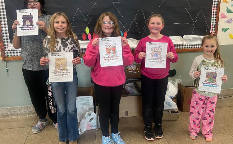 courtesy photos Mullen’s Dayspring Bank held a coloring contest for the preschool and elementary students, with the winners of each class receiving gingerbread house kits. Pictured above, l-r: Pandora Gray - 5th grade, Kendall Phipps - 4th grade, Taylor Cash - 3rd grade, Tatum Deibler - 2nd grade, Brogan Jewell - kindergarten. Not pictured: Fallon Lee - 1st grade.
