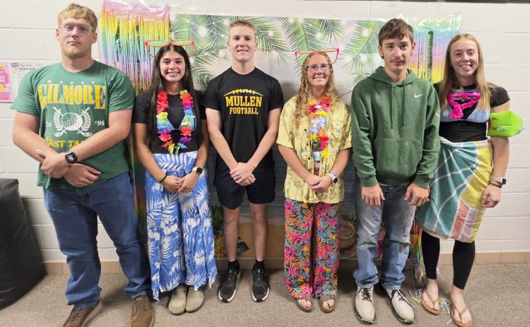 The MHS Homecoming court dressed in their “Aloha” outfits on Monday of Homecoming week, l-r: Daniel Wright, Ella Rice, Brandon Hardin, Riley Hegland, Hunter Brown, Harper Andersen. Mike Kvanvig