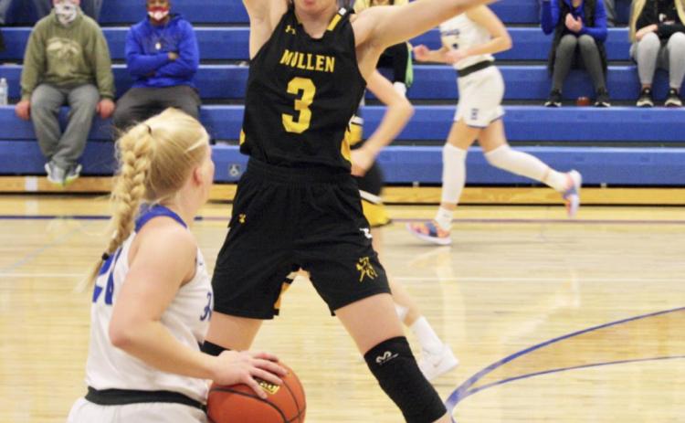 Sue Licking Shelby Welsh plays defense at Hershey last Tuesday.
