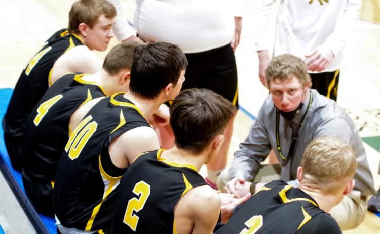 Head Coach Brad Wright talks with his starters at Gordon last Friday, l-r: Jaden Emerson, Brendon Walker, Bryce McIntosh, Trevor Kuncl and Clayton Moore. Barb McIntosh