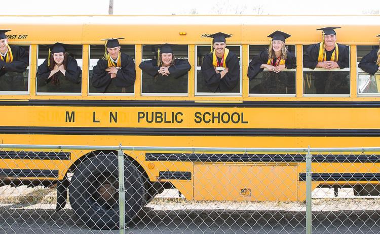 The MHS class of 2026 on graduation day, l-r: Jacob Walker, Alex Werner, Trinity Marks, Cayden Hampton, Morgan Hassett, Jaylon Forsen, Sydnee Cheever, Tate Kvanvig, Hayley Donohoe. Megan Andersen Photography