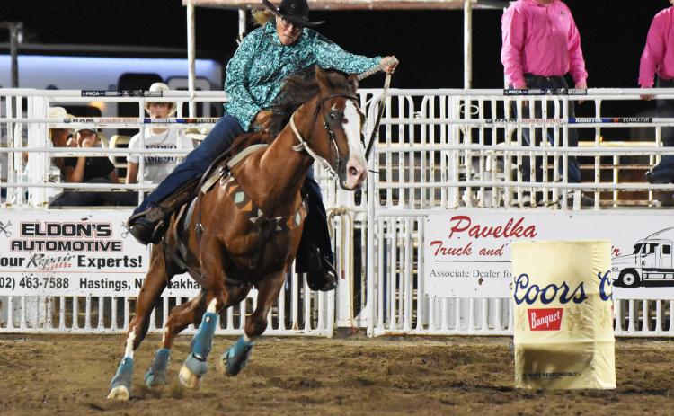 Steve Moseley, the “mostly retired managing editor and photographer at the York News-Times” said photographing rodeos has become a hobby for him and when he takes photos of someone from small town Nebraska, he tries to pass the image along to their hometown newspaper. Mullen’s Deb Cox was running barrels last Friday, Aug. 16 at the 33rd annual Oregon Trail Rodeo in Hastings when he snapped this photo. Steve Moseley
