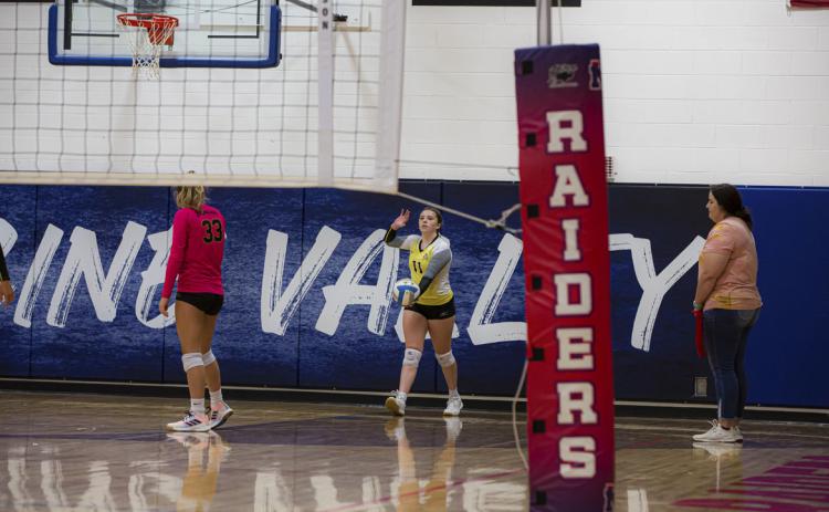 Izzy Hoyt prepares to serve at Medicine Valley, where she was 7/7 and scored 3 points for the Lady Broncos. Megan Andersen