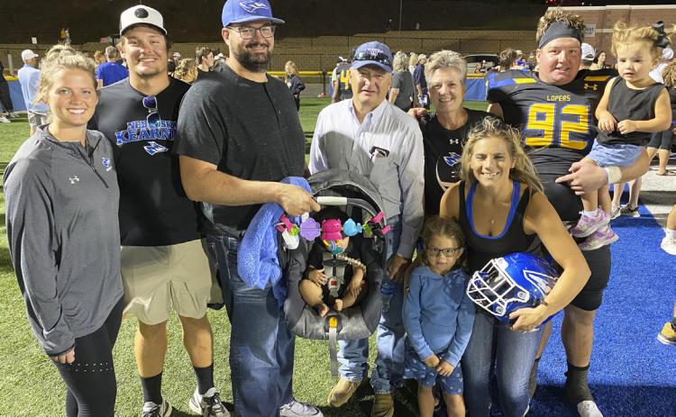 Jeff and Tammy Spies surrounded by their family, l-r: Kelsey Goodban, Tye, Jake, Charleigh, Jeff, Tammy, Rynnleigh, Breezy, Tell and Hadleigh Spies. courtesy photo