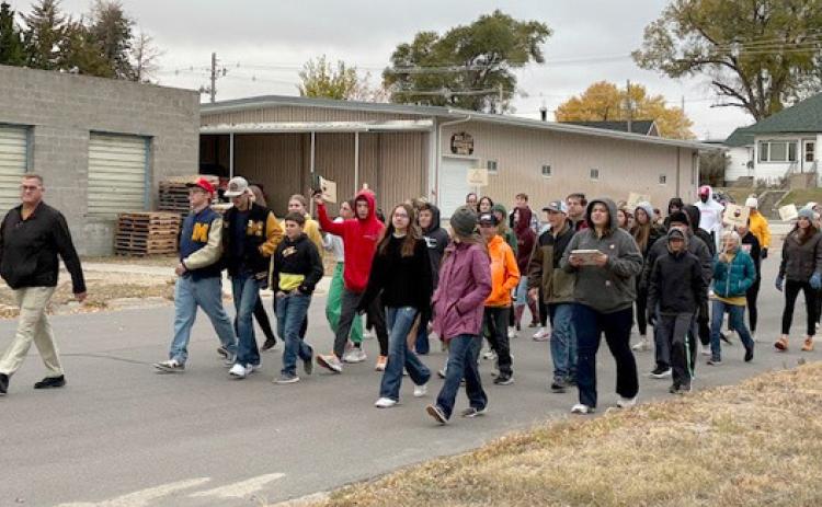 Mullen TeamMates mentors and mentees participate in the One Mile Walk last Wednesday. Kara Connealy