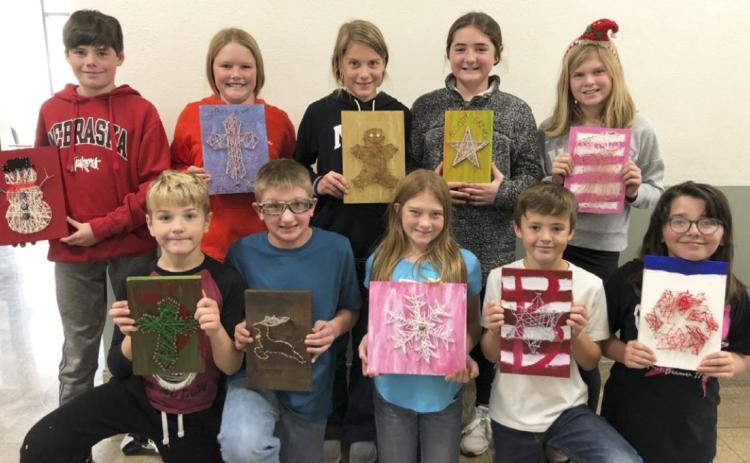 5th graders create string art pieces