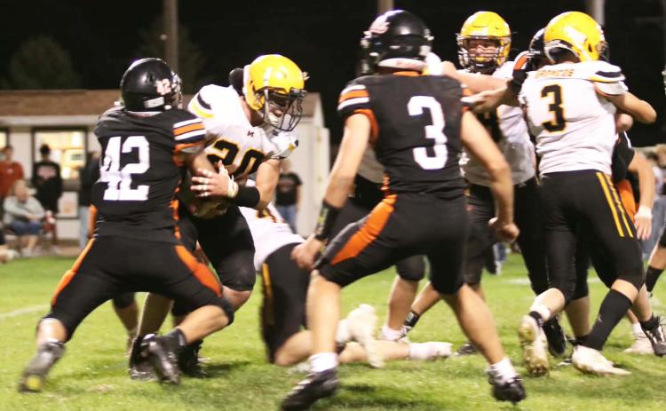 Cooper Walker carries the ball at Maxwell last Friday. Carolee Brown Photography
