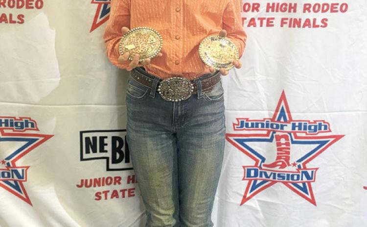 Abbigail Mundorf with her barrel racing buckles at State Finals. Katie Dent