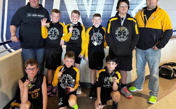 The Mullen 5th grade boys basketball team won the 5th grade boys Division C of the Kearney Snow Jam two-day tournament this past weekend. Pictured back, l-r: Coach Eric Deibler, Caleb Deibler, Jackson Newman, Duke Miller, Hunter Gray, Coach Wade Marsh. Front: Cylas Dent, Kyler Marsh, Lorenzo Gonzalez