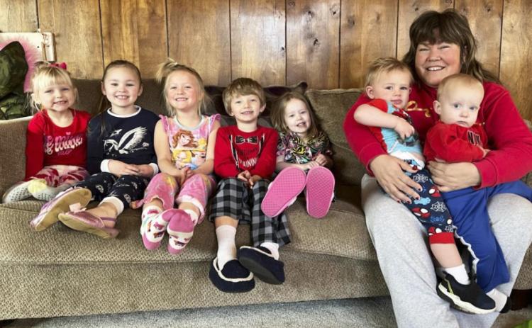 L-r: Violet Stichka, Brogan Jewell, Danielle Peterson, Merick Lattin, Aurora Polt, Lori Folk holding Chasin McIntosh and Arthur Polt. Gerri Peterson