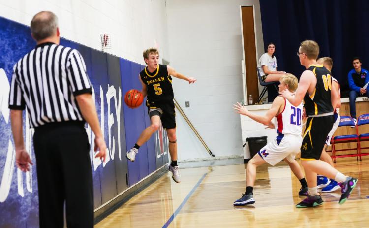Kyle Finney hustles to keep the ball in bounds for the Broncos against Medicine Valley.